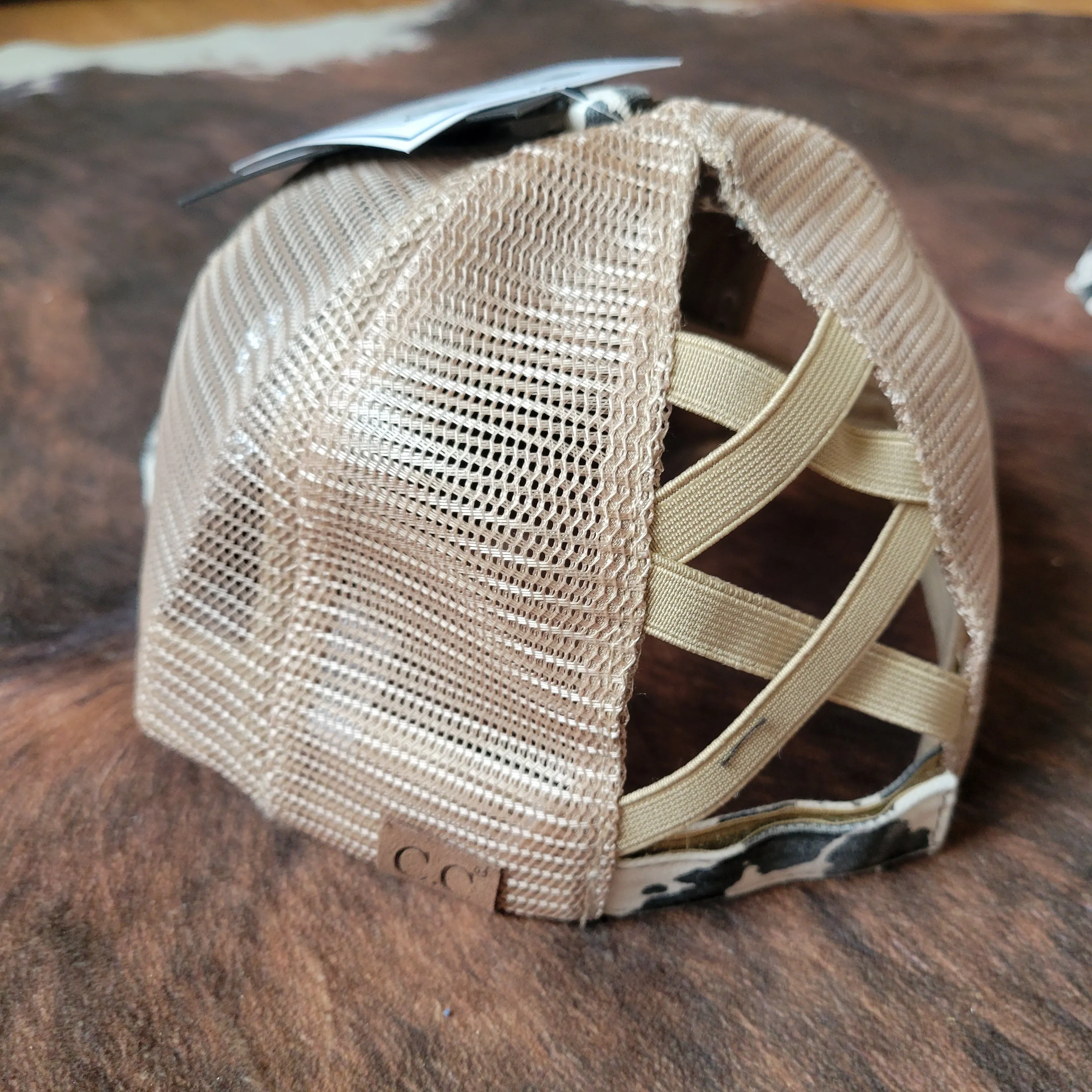 C.C. Cow Print Criss Cross Ponytail Hat - Beige