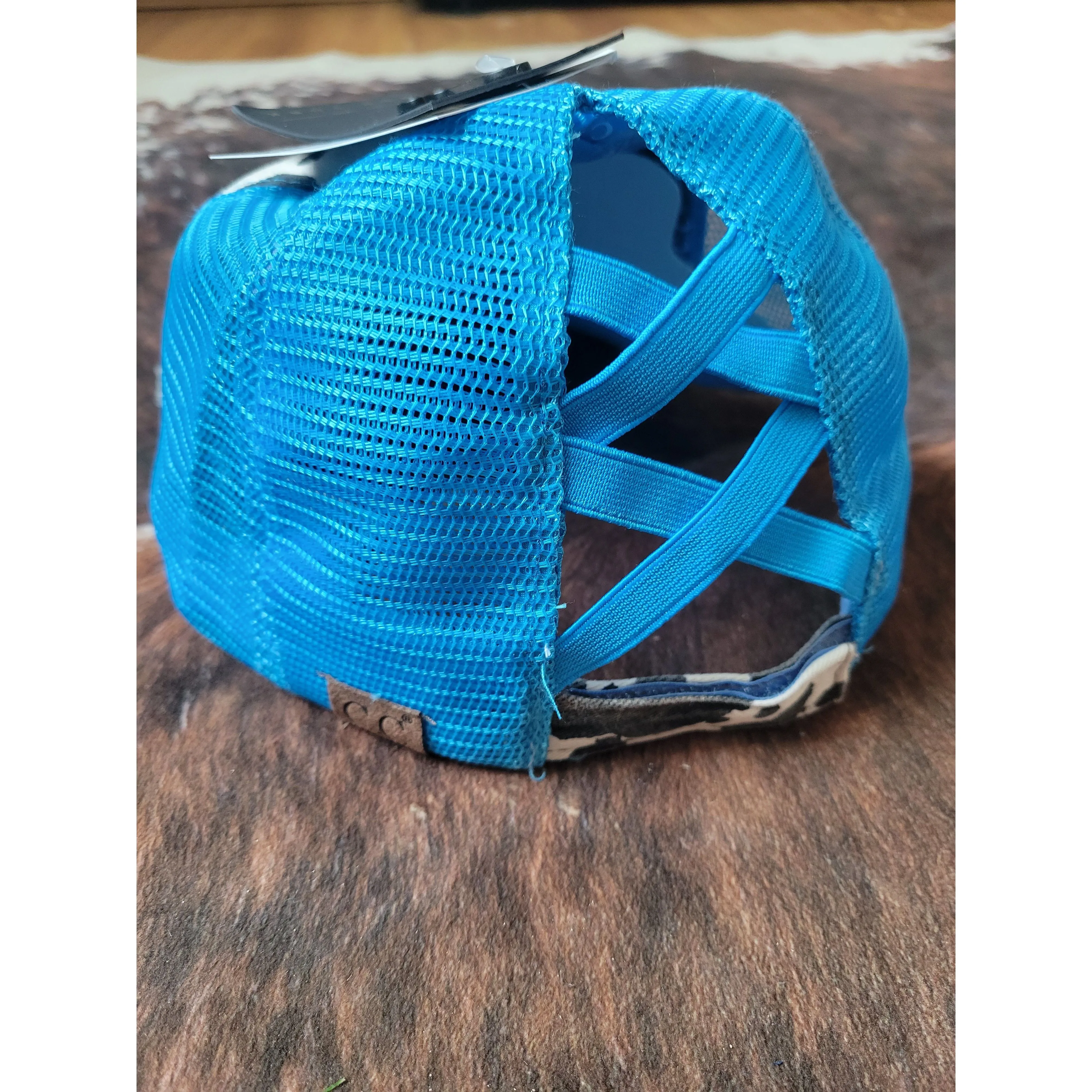 C.C. Cow Print Criss Cross Ponytail Hat - Turquoise