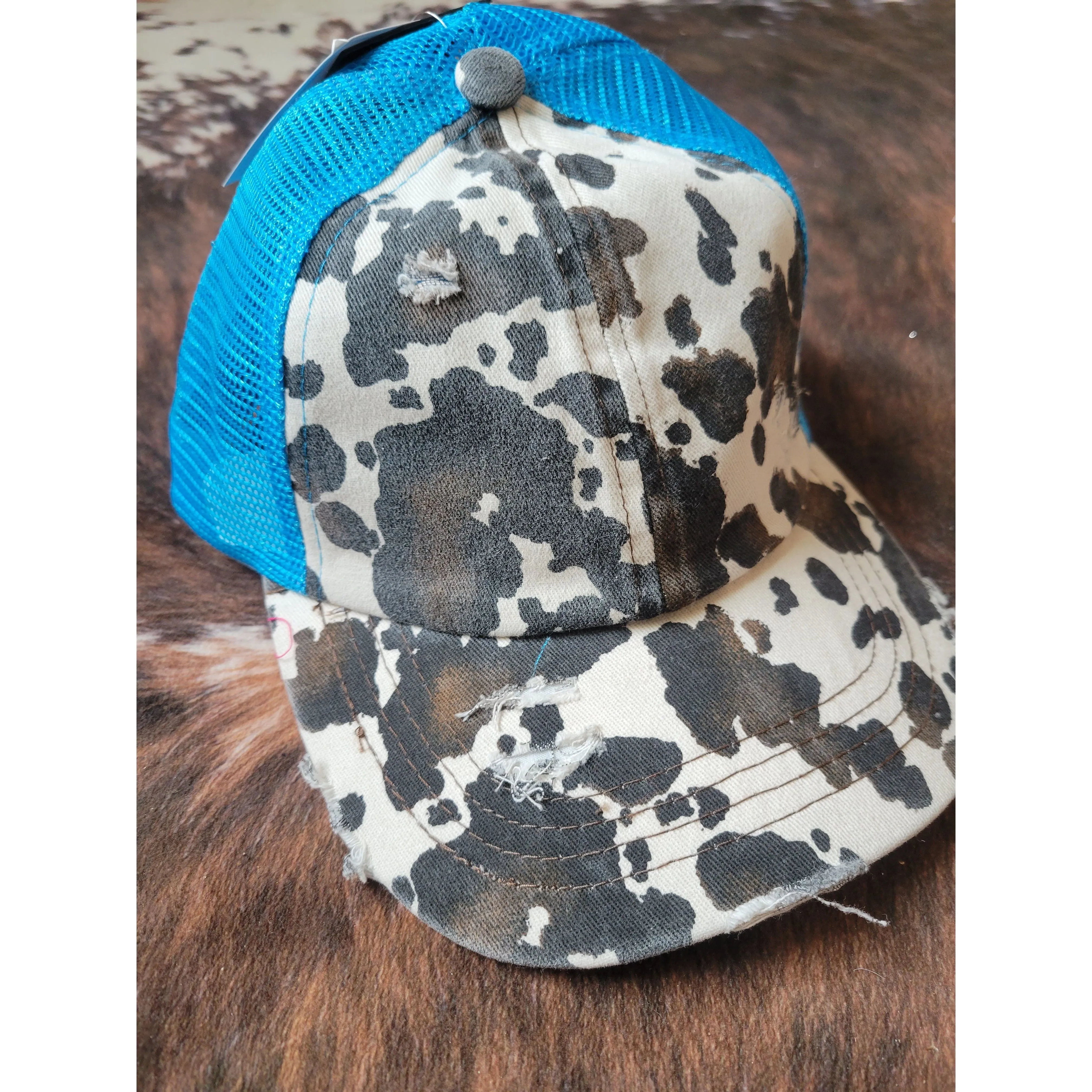 C.C. Cow Print Criss Cross Ponytail Hat - Turquoise